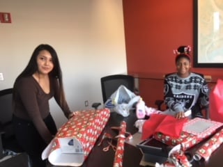 BPG associates wrapping presents
